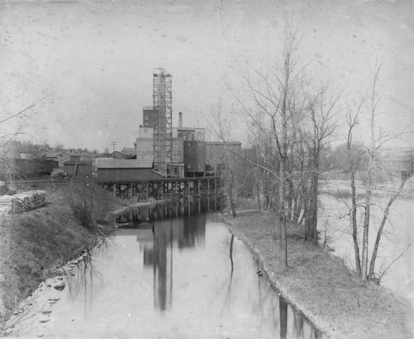 Elevated view over canal towards the Empire Mill.