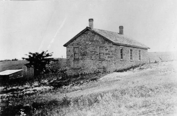 Exterior view of a District No. 4 school building, built in 1845.