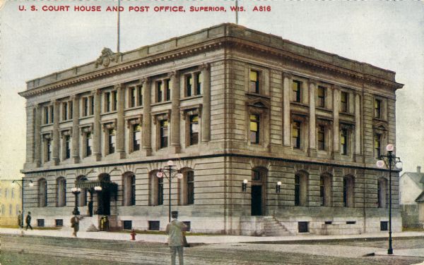 Exterior view across street toward the Courthouse and Post Office. Caption reads: "U.S. Courthouse and Post Office, Superior, Wis."
