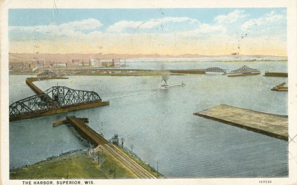 Elevated view of the harbor. Caption reads: "The Harbor, Superior, Wis."