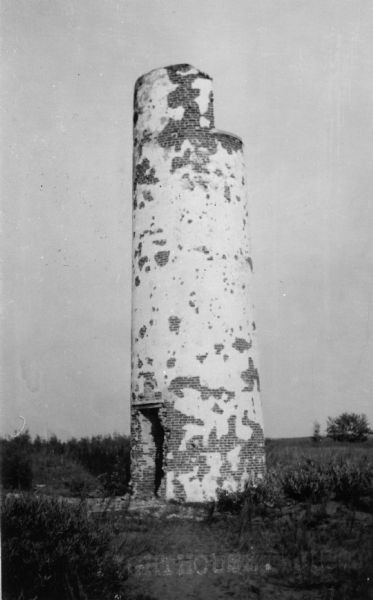 View of the remnants of the Minnesota Point Lighthouse. Faint caption at bottom reads: "Lighthouse".