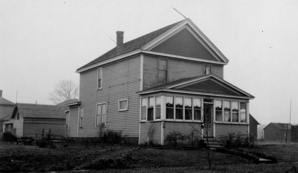 Exterior view of the Bradshaw home, erected in about 1927 by Peter E. and John W. Bradshaw as a general store.