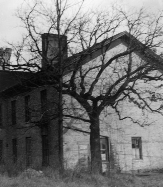 Exterior rear view of the first public school building on the hill.