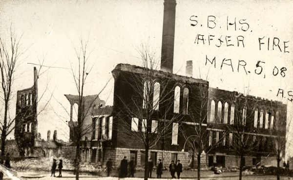 The Sturgeon Bay High School after the fire the destroyed the building on March 5, 1908. Handwriting on front reads: "S.B. H.S. After Fire Mar. 5, 08 — A.S."