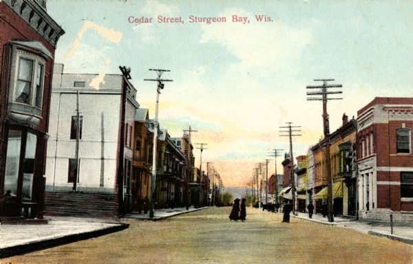 View down Cedar Street. Caption reads: "Cedar Street, Sturgeon Bay, Wis."