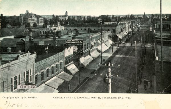 Elevated view of Cedar Street. Caption reads: "Cedar Street, Looking South, Sturgeon Bay, Wis."