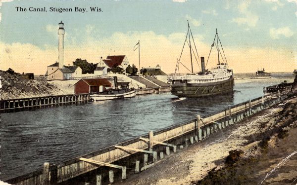 View of the canal. Caption reads: "The Canal, Stugeon[sic] Bay, Wis."