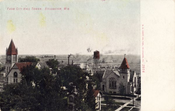 Elevated view of Stoughton. Caption reads: "From City Hall Tower, Stoughton, Wis."