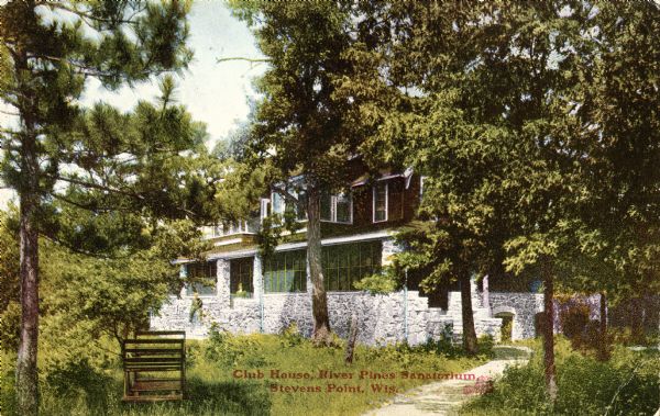 Exterior view of the clubhouse at River Pines Sanatorium. Two people are posing on the porch. Caption reads: "Club House, River Pines Sanatorium, Stevens Point, Wis."