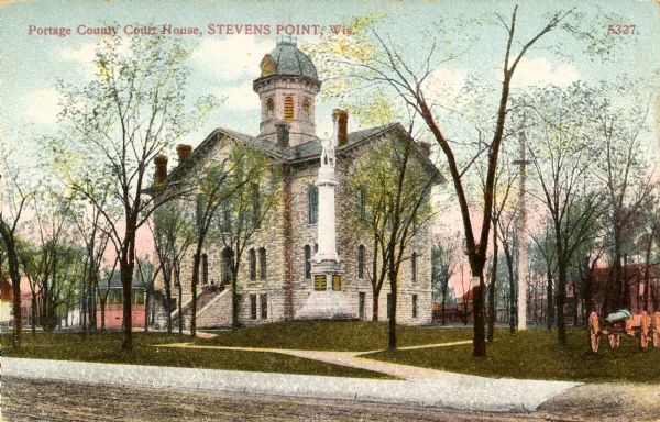 Exterior view of the Portage County Courthouse. Caption reads: "Portage County Court House, Stevens Point, Wis."