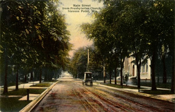 View down center of tree-lined street. Caption reads: "Main Street from Presbyterian Church, Stevens Point, Wis."