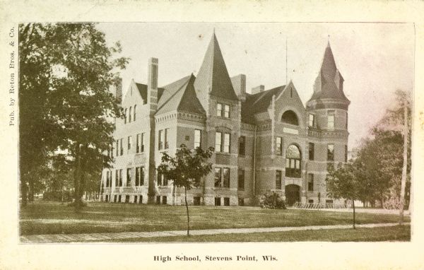 Exterior view of a high school. Caption reads: "High School, Stevens Point, Wis."