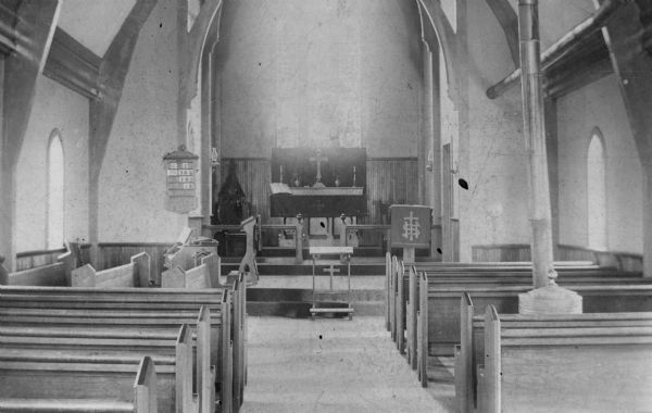 Interior view of St. John's-in-the-Wilderness Episcopal Church, looking towards the altar.