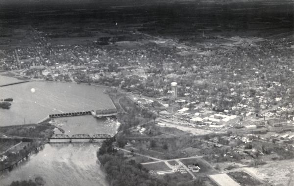 Aerial view that encompasses most of the town and part of the Wisconsin River.