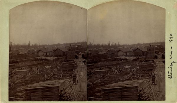 Stereograph view of a construction scene in Stanley.