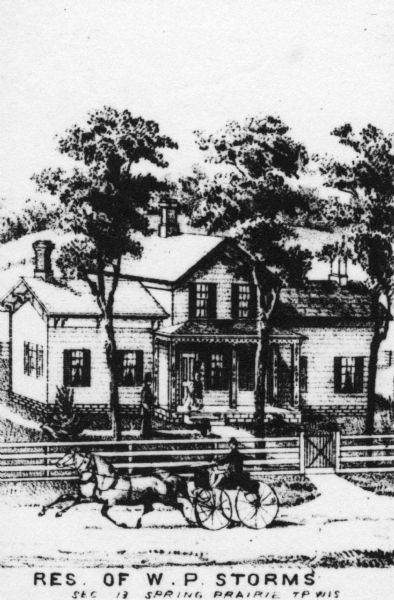 Engraved view of the W.P. Storms residence, with a horse-drawn wagon in front traveling along the road. Caption reads: "Res. of W.P. Storms Sec 13 Spring Prairie TP Wis".
