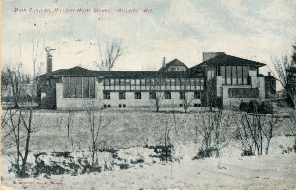 Exterior view of Hillside Home School. Caption reads: "Main Building, Hillside Home School, Hillside, Wis."