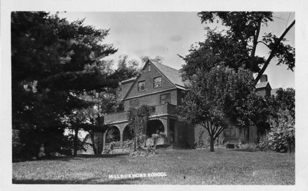 The first building built for the Hillside Home School, 4 Miles from Spring Green. Exterior view of the Hillside Home Building, a Shingle Style building, designed by Frank Lloyd Wright in 1887 for his aunts, Jane and Ellen Lloyd Jones. It was used as a dormitory and library. Wright had the building demolished in 1950.