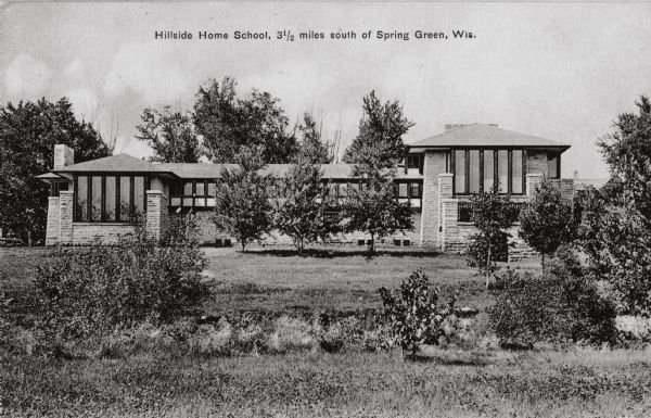Exterior view of Hillside Home School, designed by Frank Lloyd Wright in 1901 and constructed over the next two years. Caption reads: "Hillside Home School, 3 1/2 miles south of Spring Green, Wis."