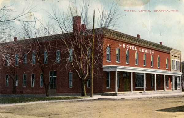Diagonal view across road toward the hotel. Caption reads: "Hotel Lewis, Sparta, Wis."