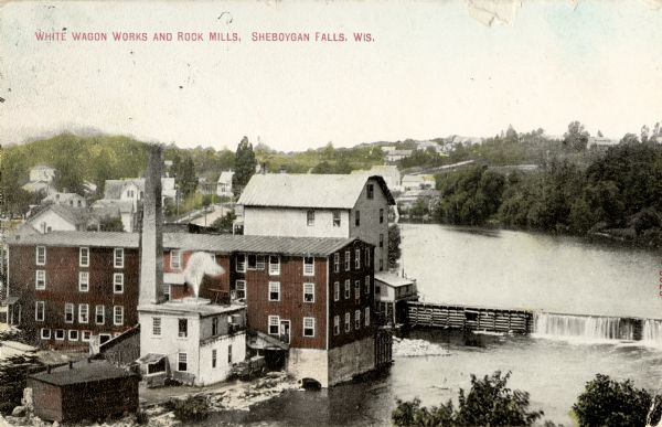 Elevated view of the White Wagon Works and Rock Mills. Caption reads: "White Wagon Works and Rock Mills, Sheboygan Falls, Wis."