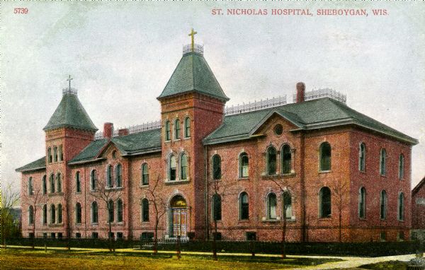 Exterior view of St. Nicholas Hospital. Caption reads: "St. Nicholas Hospital, Sheboygan, Wis."