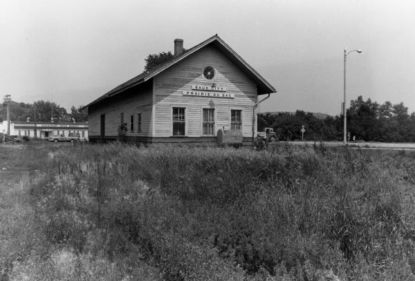 Exterior view of the Milwaukee Road railroad station on the last day of operation by the line.