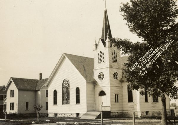 Exterior view of a Lutheran church and parsonage. Caption reads: "Luth. Church & Parsonage, Rosendale Wis."