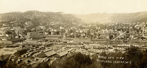 Elevated view of town from hill. Caption reads: "Birds Eye View Richland Center, Wis".
