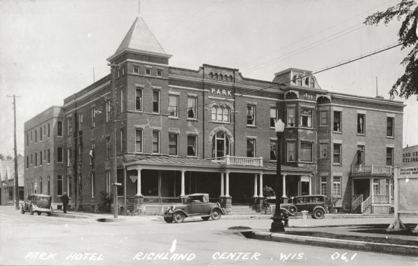 Exterior view of the Park Hotel and surrounding streets. Caption reads: Park Hotel Richland Center, Wis."