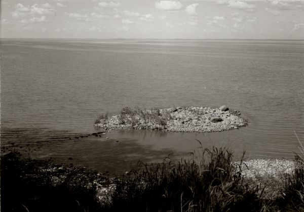 Elevated view of a small island near the Green Bay shore.
