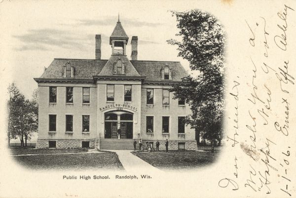 Exterior view of a public high school A Group of people are standing on the sidewalk near the front steps. Caption reads: "Public High School, Randolph, Wis."