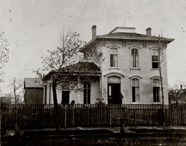 Exterior view from street towards a Presbyterian parsonage.