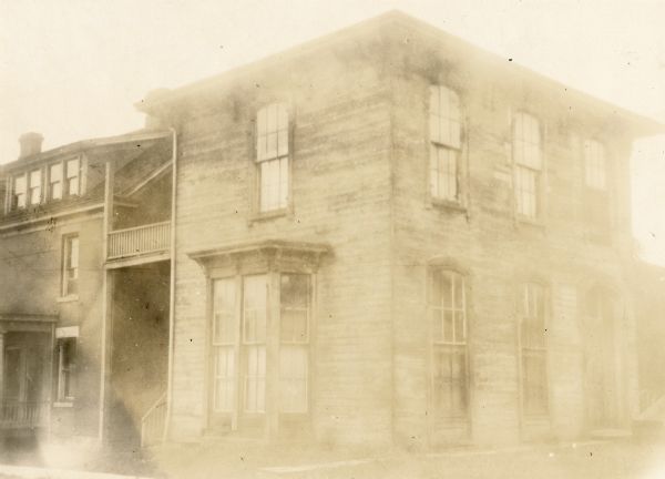 The former Gilbert Knapp house, on Carroll Street, from the north side of 7th Street between Main Street and Lake Avenue.