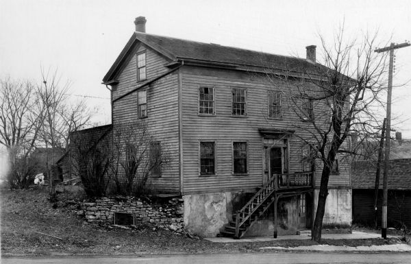 Exterior view of the Prescott House, an inn built in 1856 that served the nearby farmers until about 1870.