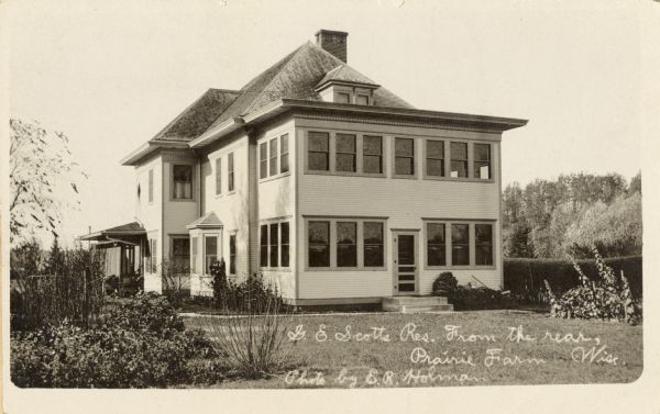 G.E. Scott residence from the rear. Caption reads: "G.E. Scotts Res. From the rear, Prairie Farm, Wis."