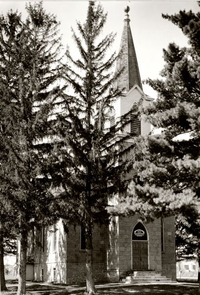 Salem Church of the Evanglical Association of North America. The original church was built in 1851 in the township of Honey Creek. This church is the third one on this site; the second was built in 1875 but burned and was rebuilt in 1904. Sometimes called the "Ragatz" church because one of the Ragatz family donated the land for the first church. Cf. History of Sauk County, 1880.