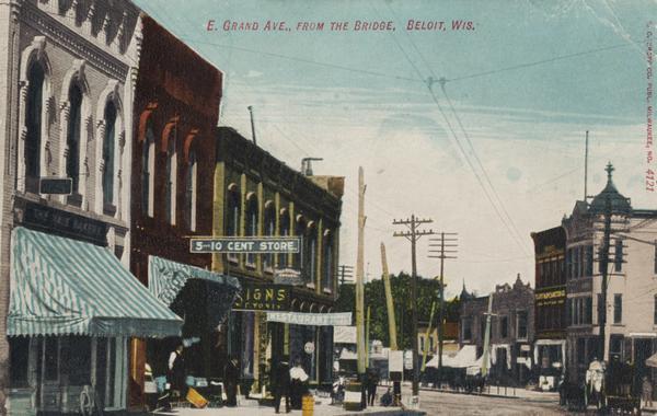 The 5 and 10 cent store, with the Yale bakery, and a restaurant on East Grand Avenue visible from the bridge. Caption reads: "E. Grand Ave., form the Bridge, Beloit, Wis."