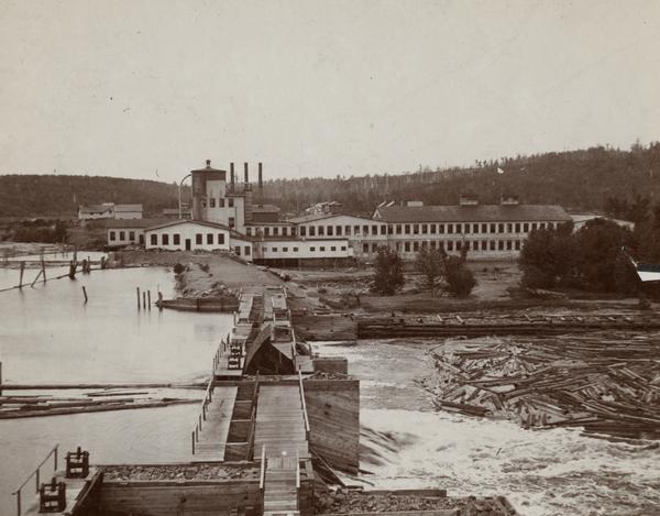 View of the Wausau mill and dam next to the river, where logs were first sorted.