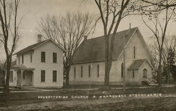 Front entry view of the Presbyterian Church and adjoining parsonage.