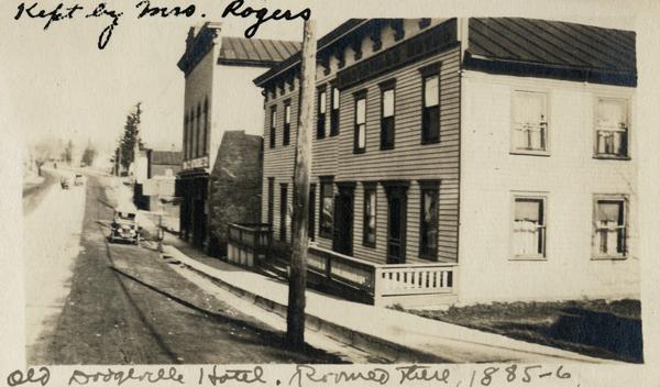 Dogeville Hotel (proprietress was Mrs. Rogers), and the Spang Opera House.