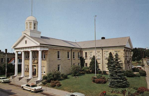 Elevated view of the gardens and buildings of the Iowa County Court House.
