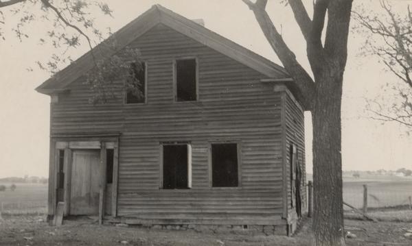 Burdick homestead, which was originally made from logs. Built in 1842, it was said to be the first house west of the Rock River.