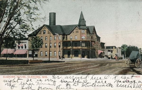 View down road towards the Elkhorn House. Caption reads: "Elkhorn Hosue, Elkhorn, Wis."