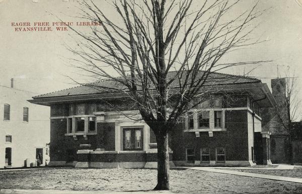 Exterior view of library. Caption reads: "Eager Free Public Library, Evansville, Wis."