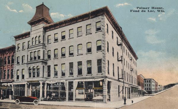 Exterior view fro street towards the Palmer House. Caption reads: "Palmer House, Fond du Lac, Wis."