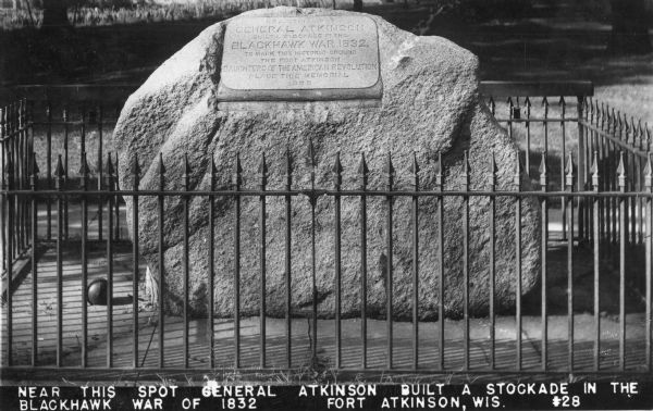 Monument commemorating the place where General Atkinson built a stockade when he and his troops fought Black Hawk. Caption reads: "Near this spot General Atkinson built a Stockade in the Blackhawk war of 1832".