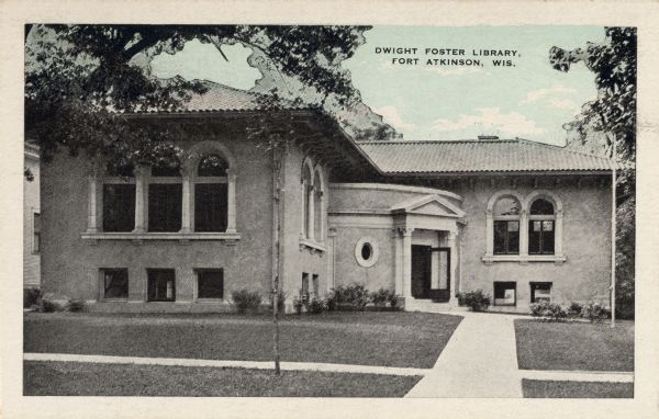 Exterior view of the library. Caption reads: "Dwight Foster Library, Fort Atkinson, Wis."
