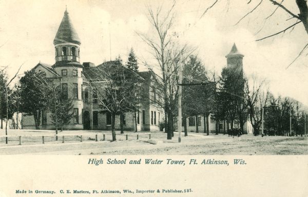 High School and water tower. Caption reads: "High School and Water Tower, Ft. Atkinson, Wis."