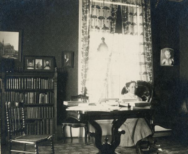 Israel Greene Beaumont House located at 203 South Jefferson Street.  Anne ("Aunt Nan") Brett is seated in the south wing room. Beaumont's house was demolished in 1932.
